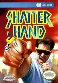 Shatterhand NES cover art showing a cyborg hero with mechanical fists in a sci-fi setting.