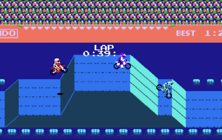 Motorcycles racing over a hill on the nintendo game.