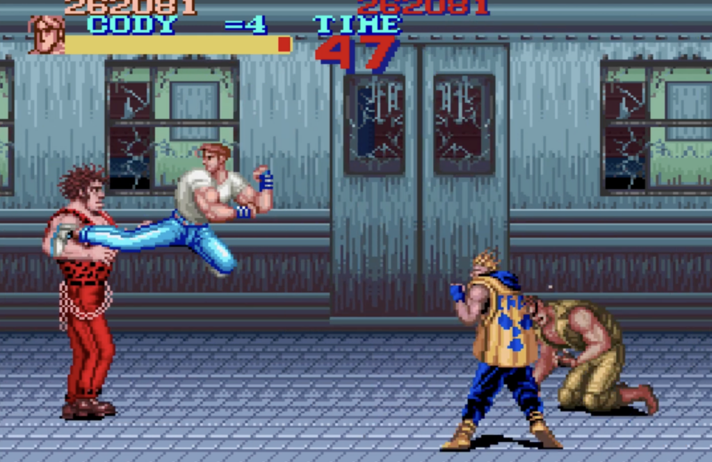Final Fight SNES Cody kicking Andore in the subway.