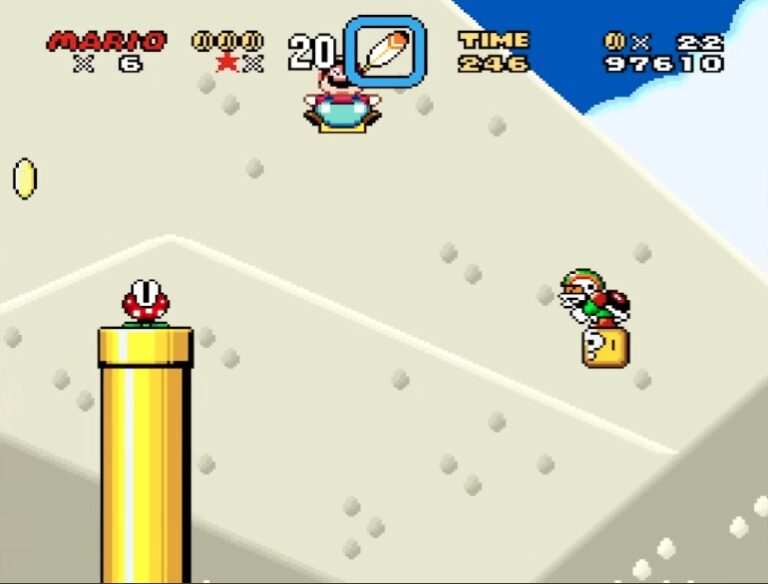 Super Mario World has the power balloon and is floating through a stage.