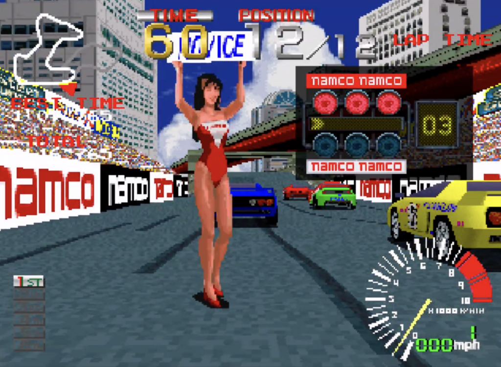 Ridge Racer, woman holding up a sign on the track before the race starts.