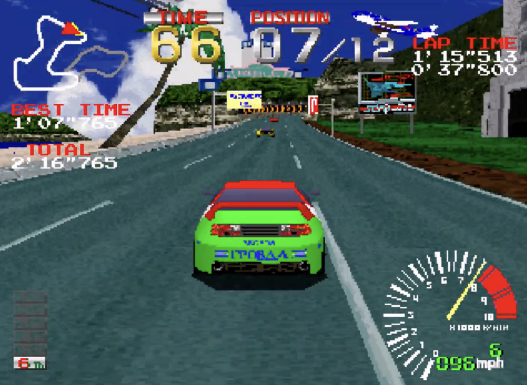 Ridge Racer green race car is racing in a street.