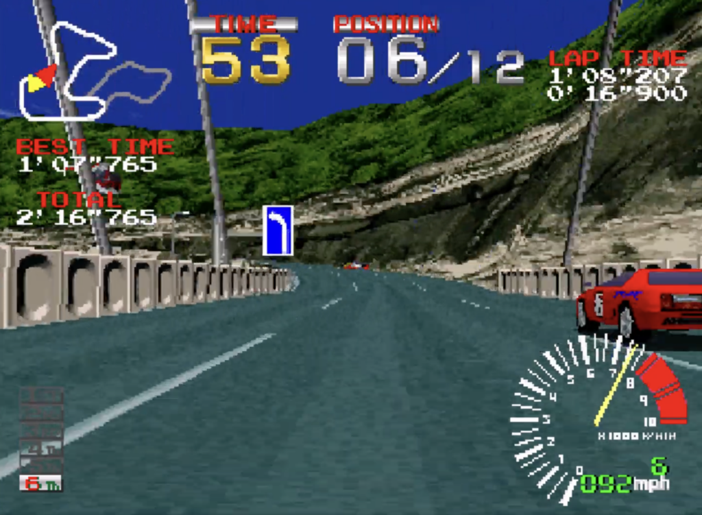 Ridge Racer POV of a race car racing in a track.