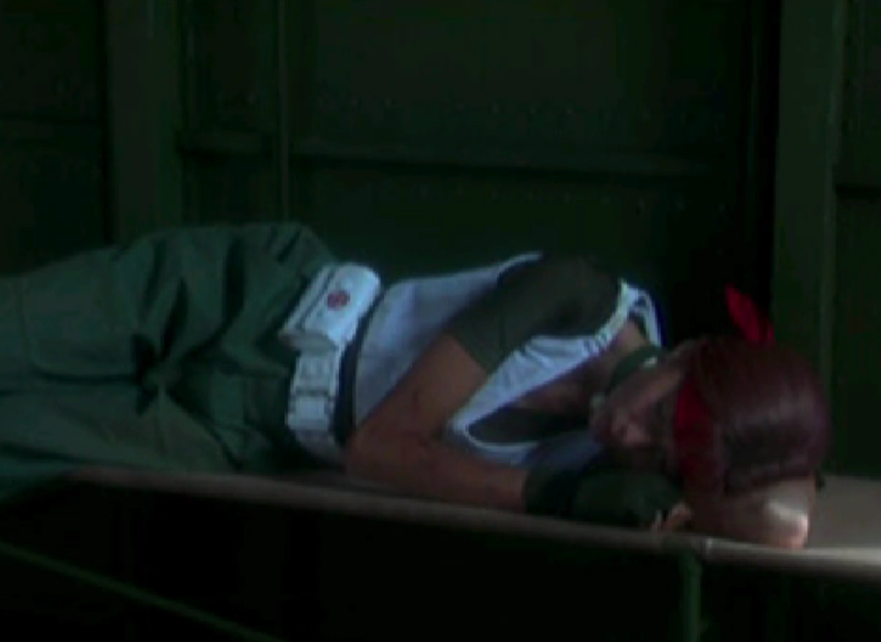 Resident Evil, Rebecca laying down on bench in helicopter.