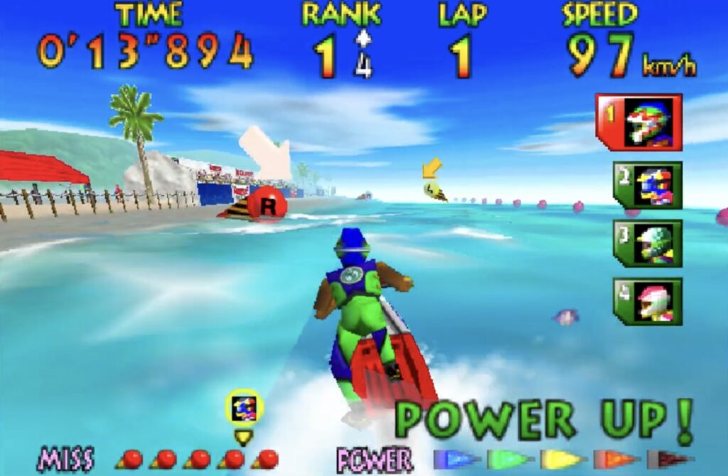 Wave Race 64, racer in green suit riding a red jet ski with crystal blue water.