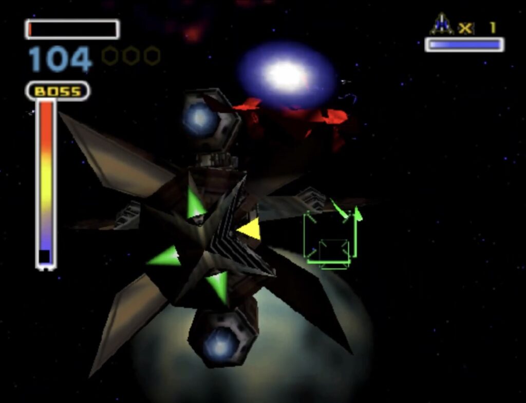 Star Fox 64, the Arwing is shooting at a boss ship.